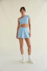 Avery Smoothing Flare Tennis Skort in Blue