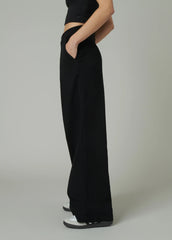THE PLEATED DENIM TROUSER