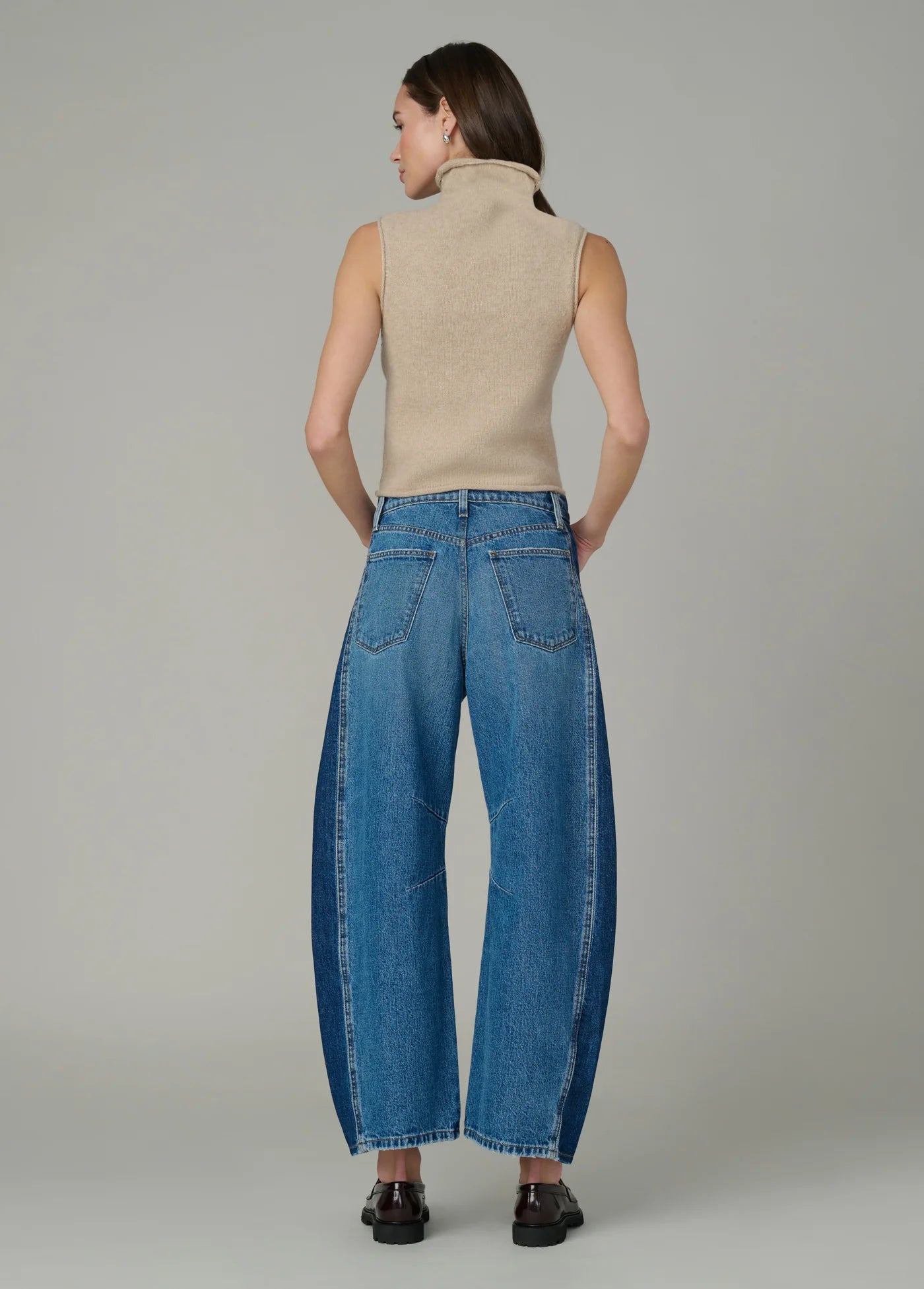 THE STEVIE SLEEVELESS ROLL NECK SWEATER