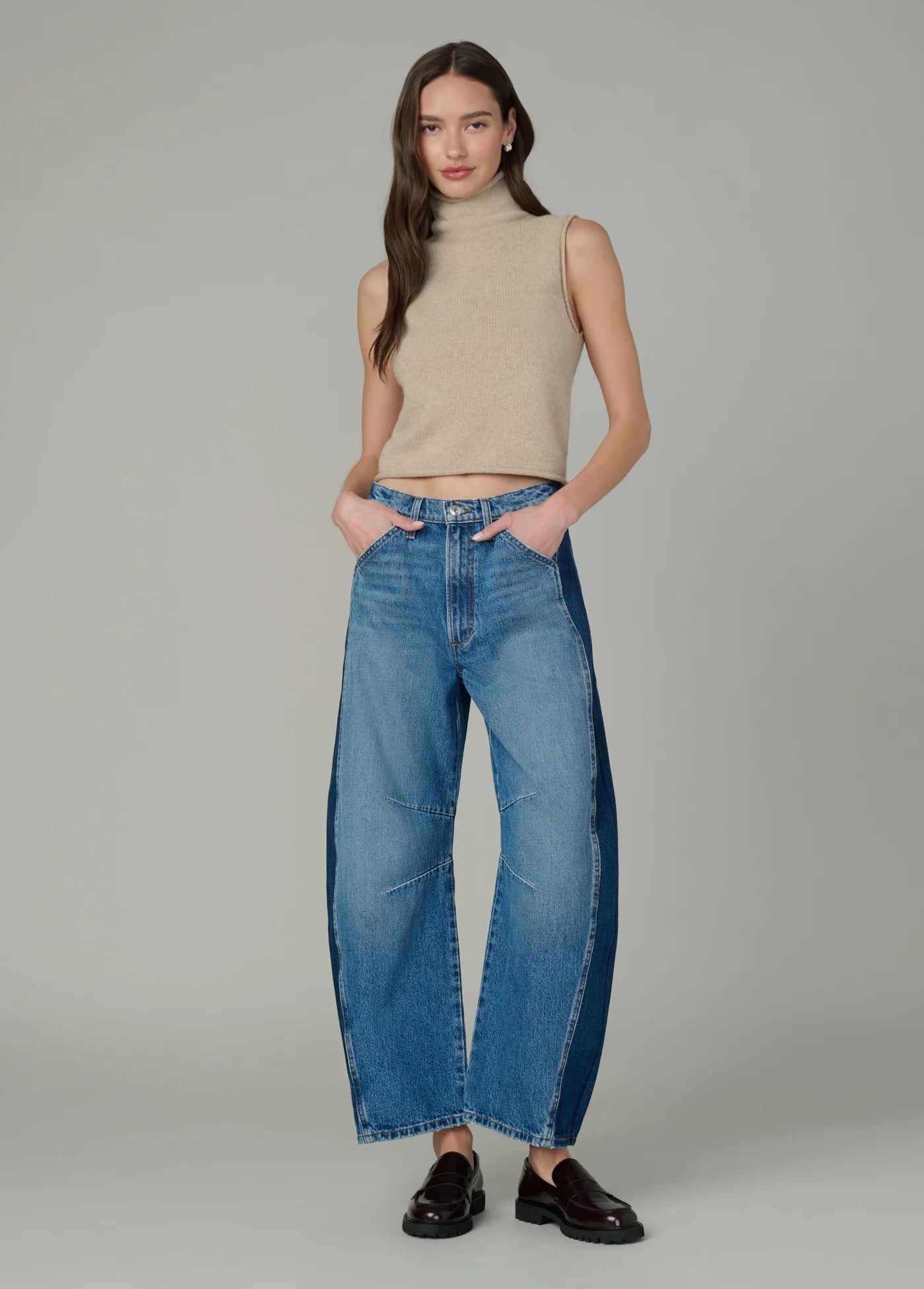THE STEVIE SLEEVELESS ROLL NECK SWEATER
